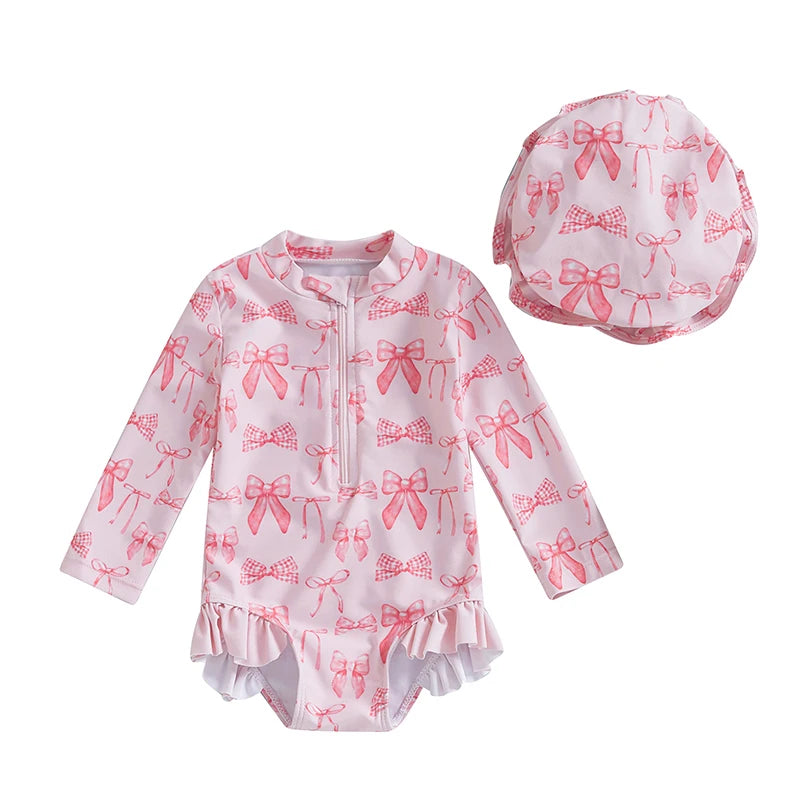 Maillot de bain rashguard à manches longues pour fille avec imprimé nœud et chapeau assorti pour s'amuser à la plage et à la piscine
