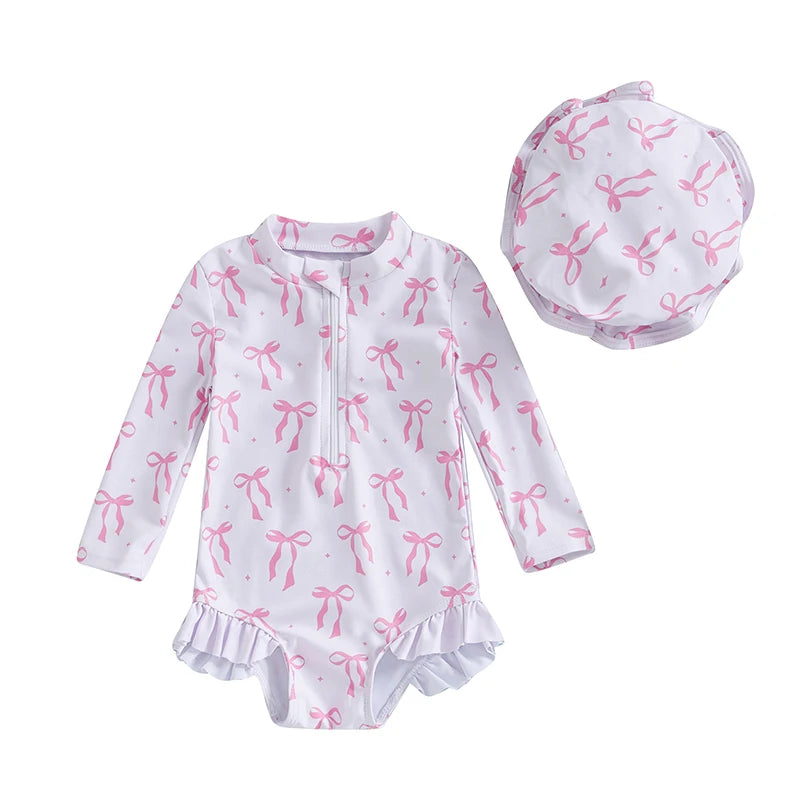 Maillot de bain rashguard à manches longues pour fille avec imprimé nœud et chapeau assorti pour s'amuser à la plage et à la piscine