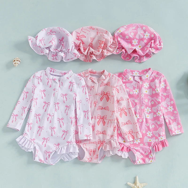 Maillot de bain rashguard à manches longues pour fille avec imprimé nœud et chapeau assorti pour s'amuser à la plage et à la piscine