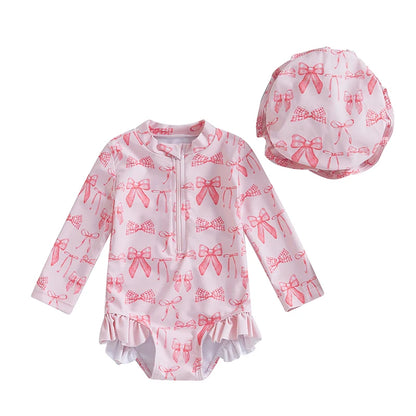 Maillot de bain rashguard à manches longues pour fille avec imprimé nœud et chapeau assorti pour s'amuser à la plage et à la piscine