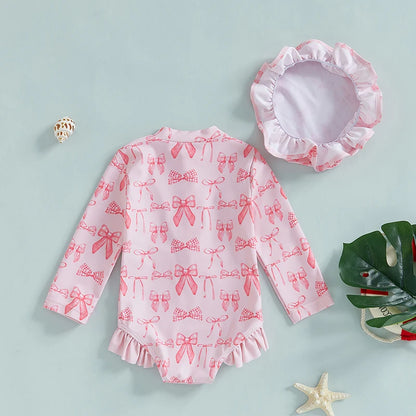 Maillot de bain rashguard à manches longues pour fille avec imprimé nœud et chapeau assorti pour s'amuser à la plage et à la piscine