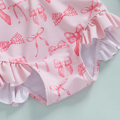 Maillot de bain rashguard à manches longues pour fille avec imprimé nœud et chapeau assorti pour s'amuser à la plage et à la piscine