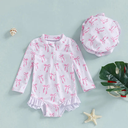 Maillot de bain rashguard à manches longues pour fille avec imprimé nœud et chapeau assorti pour s'amuser à la plage et à la piscine